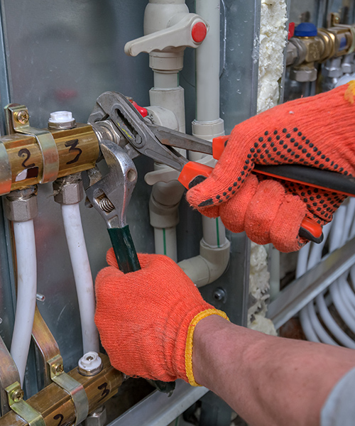 wrench tighting pipes massapequa ny